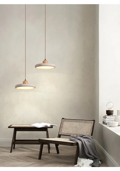 Set of 2 Mannelli Circular Travertine Stone Pendant Lights in wabi sabi room
