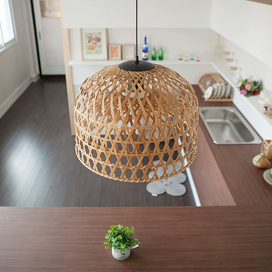Shuangz Bamboo Woven Dome Pendant Light hangs over Boho Kitchen Island