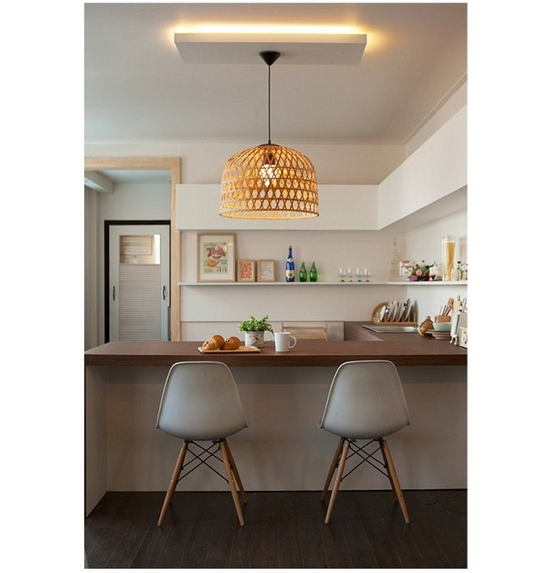 Shuangz Bamboo Woven Dome Pendant Light hangs over Minimalist Modern Kitchen Island