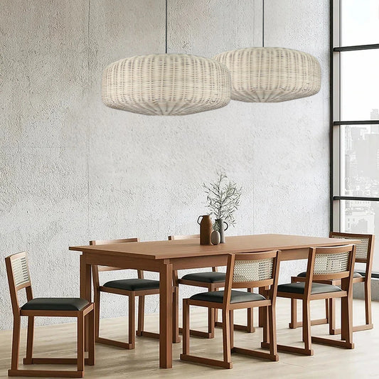Sia wicker drum pendant light over dining table