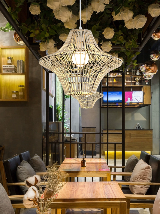 Starweave White Rattan Light Fixtures hang over Coffee Tables