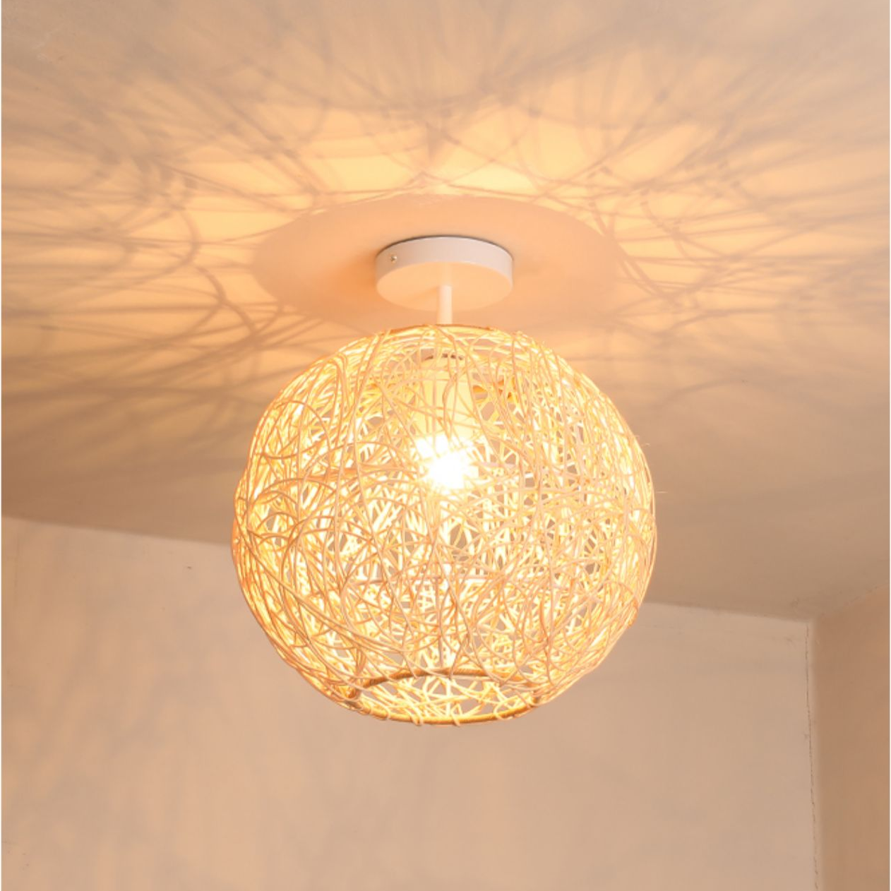 Sucada Round Rattan Ceiling Light when turn on