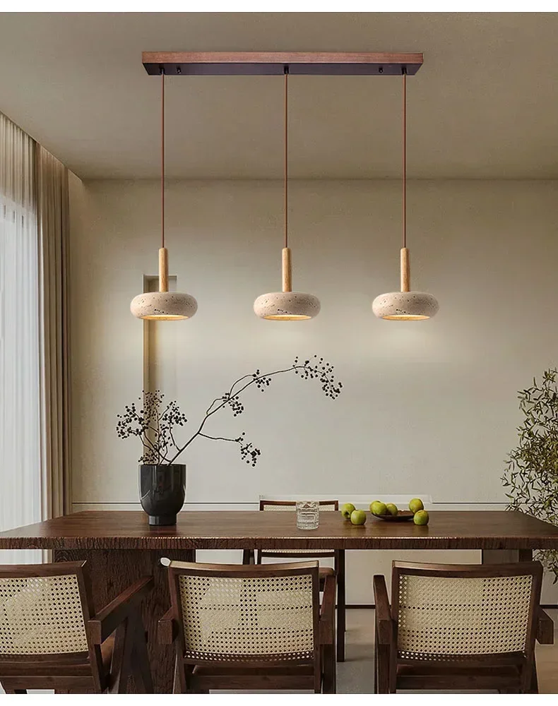 Track 3 Light Osho Round Travertine Stone Pendant Lights Hang over Wabi Sabi Dining room