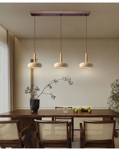 Track 3 Light Osho Round Travertine Stone Pendant Lights Hang over Wabi Sabi Dining room