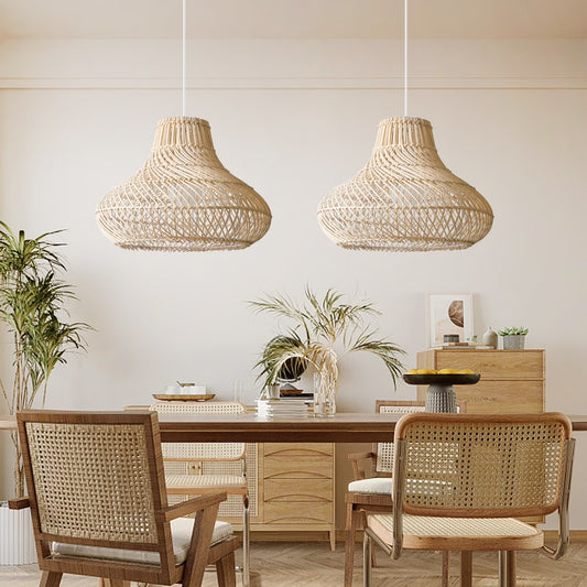 Two Dakota Natural Rattan Dome Pendant Lights hang over Boho Dining Room