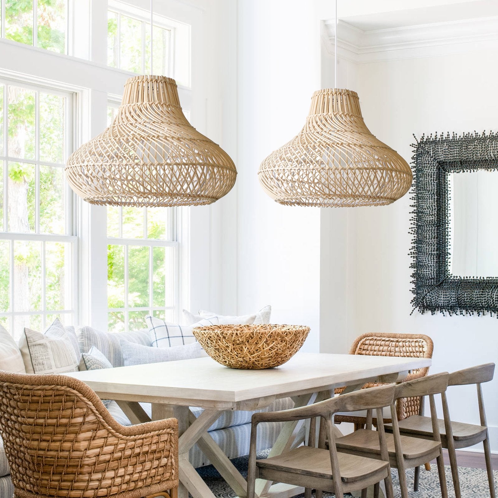 Two Dakota Natural Rattan Dome Pendant Lights hang over Boho Dining Table