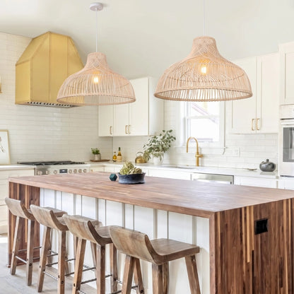 Two Des Boho Rattan Pendant Lights hang over a Kitchen Island