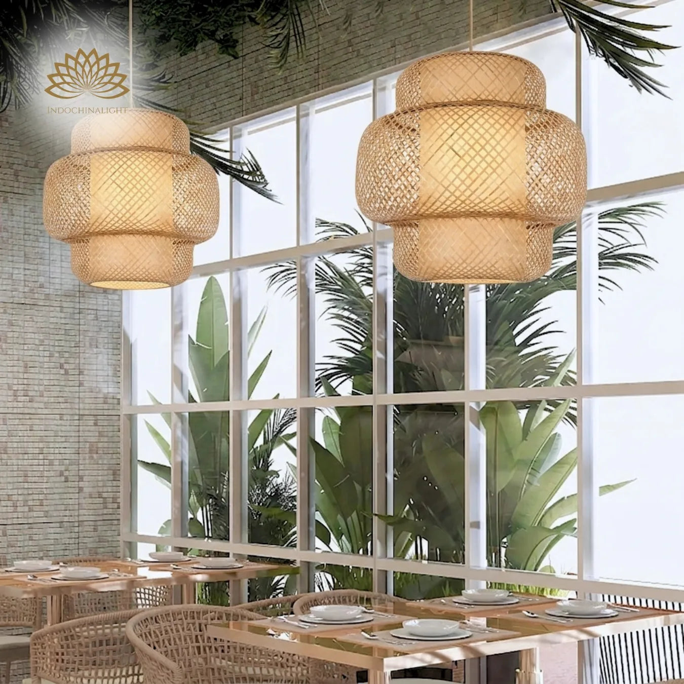 Two large Enakshi Bamboo woven pendant lights in a bright, modern dining area