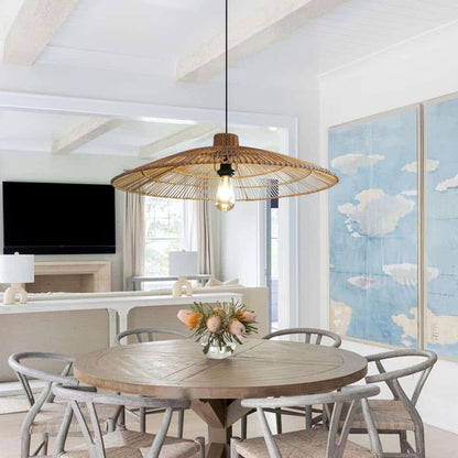 Umbrella Rattan Round Pendant Light hangs over a Coastal Dining Table