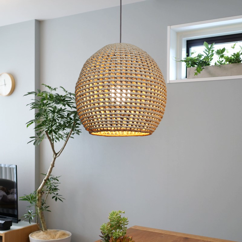 Wekiva Globe Rattan Basket Pendant Light in Japandi Space