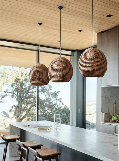 Wekiva Globe Rattan Basket Pendant Lights Hang over Kitchen Island